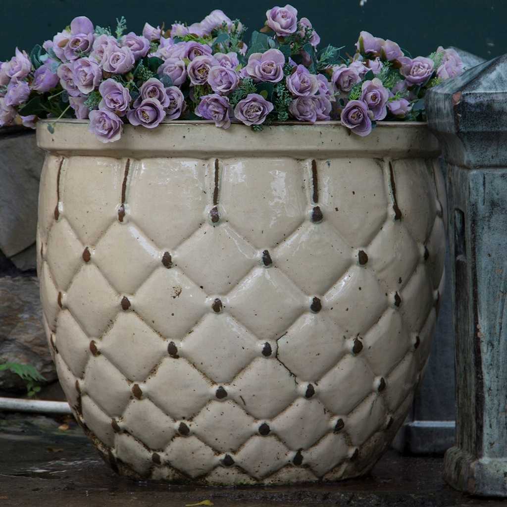 Quilted ceramic planters in white with brown accents