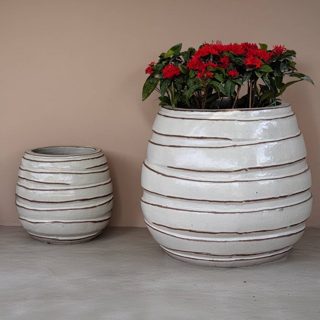 Striped ceramic planter in white with brown accent stripes