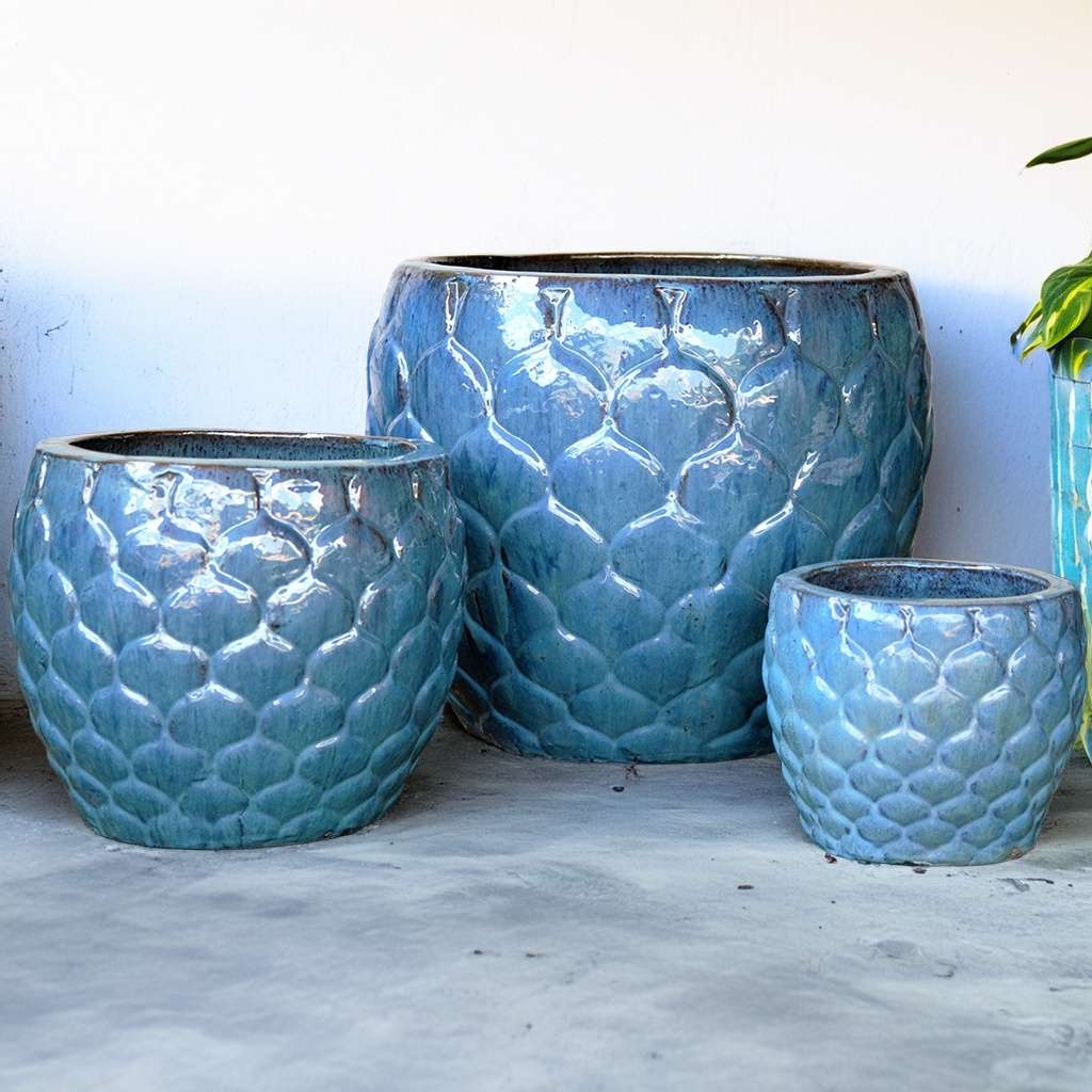 Opal green scalloped ceramic planter with a delicate, textured edge