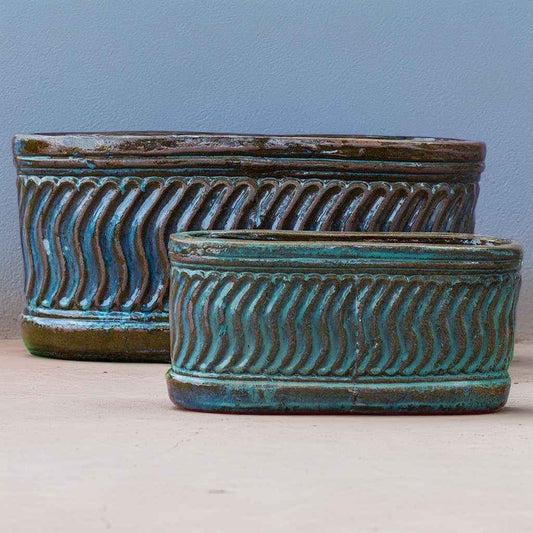 Wholesale Rectangular planter with wavy embossed texture in teal, highlighted by brown accents