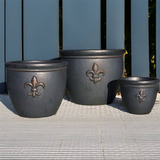 Wholesale round ceramic planters with elegant fleur-de-lis embossing in matte black