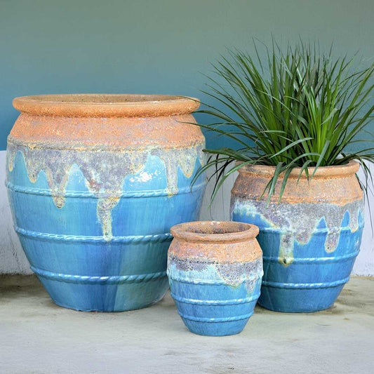Bulk Rounded ceramic planters in aqua blue featuring a rustic brown drip rim and rope-texture accents