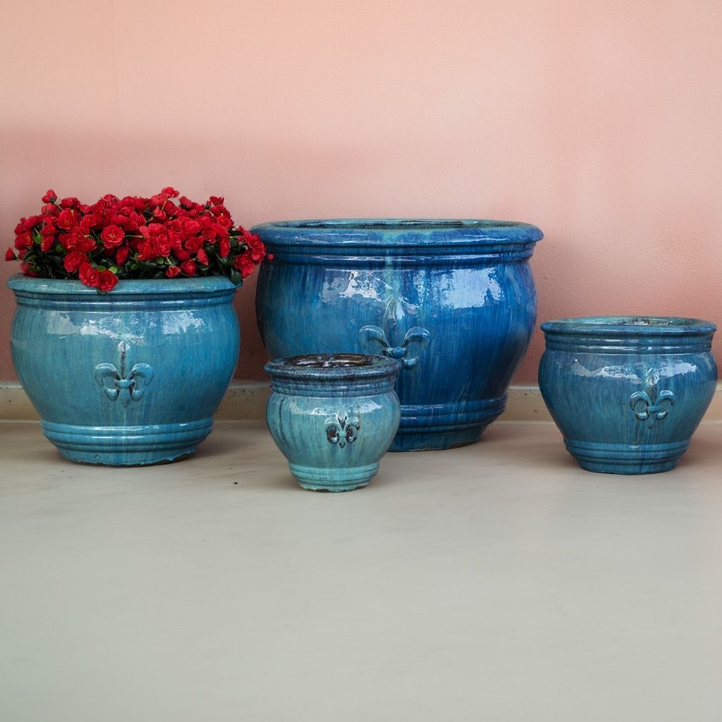 Wholesale set of glazed blue rounded flower pots with elegant embossed fleur-de-lis design
