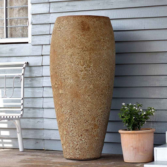 Wholesale Tall, tapered ceramic garden pot in brown with a textured, porous-looking surface for a natural, earthy appearance