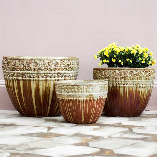 Wholesale Round brown ceramic planters with cream dripping glaze and embossed floral rims