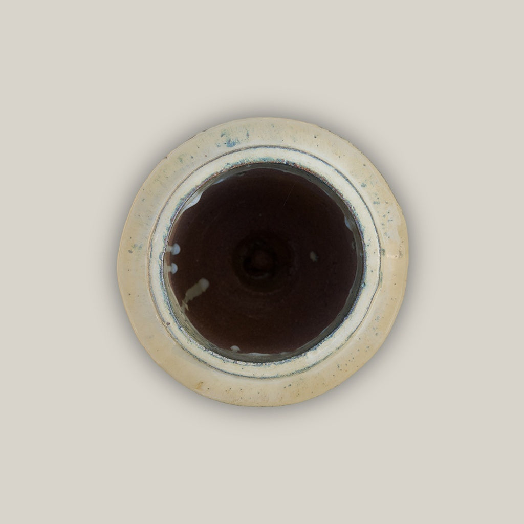 multicolored design featuring a brown base with cream-colored edges