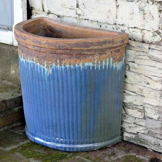 Wholesale Glazed ceramic Angkor Blue corner wall planter with a half-round ribbed texture for added dimension and style