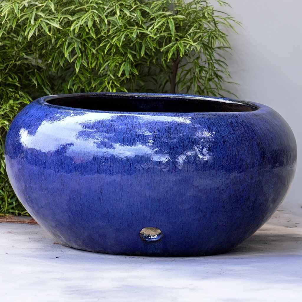 Wholesale Bulbous low bowl planter with a glossy blue finish