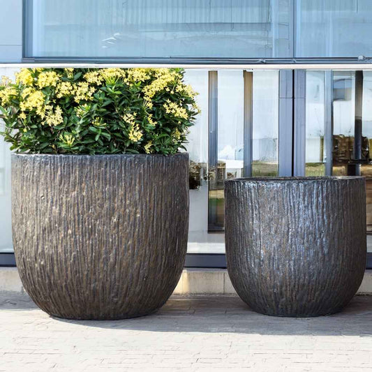 Wholesale Bronze ceramic planters with a detailed bark-like textured surface