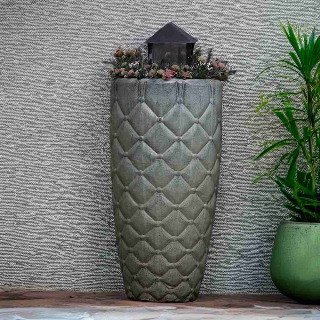 Quilted tall ceramic planter in antique moss green a textured, diamond-patterned surface