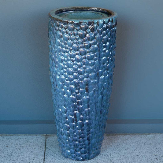 Wholesale Tall ceramic planter with a pebbled texture and a glossy blue glaze