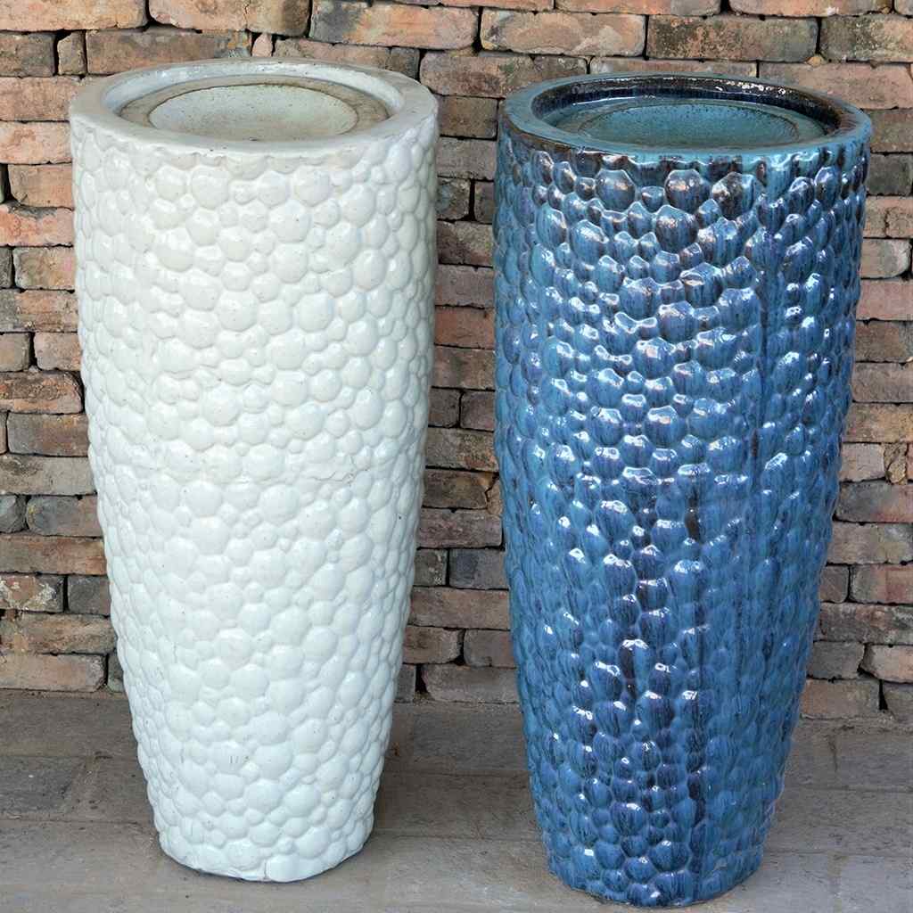 2 Tall ceramic planters with a pebbled texture in glossy white and blue