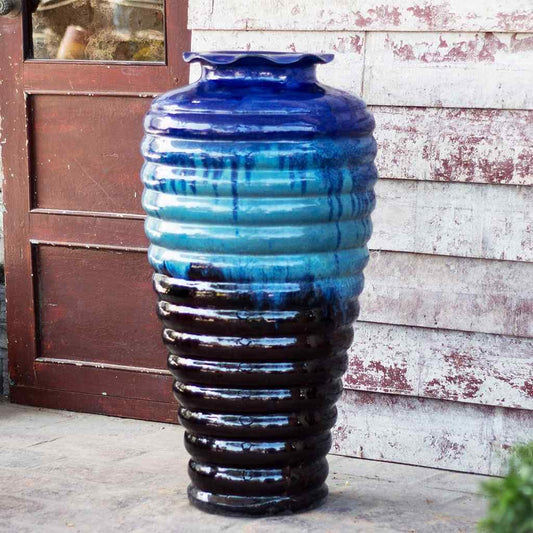 Wholesale Tall ceramic fountain jar with ribbed texture, featuring multitoned blue and dark brown shades