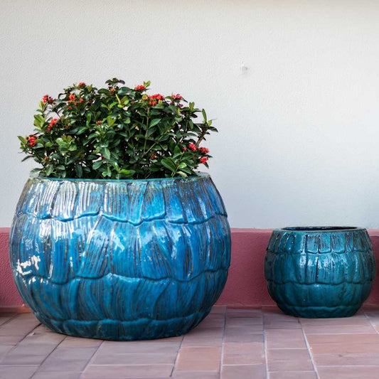Wholesale Bulbous ceramic planter with scallop texture and a glossy blue glaze