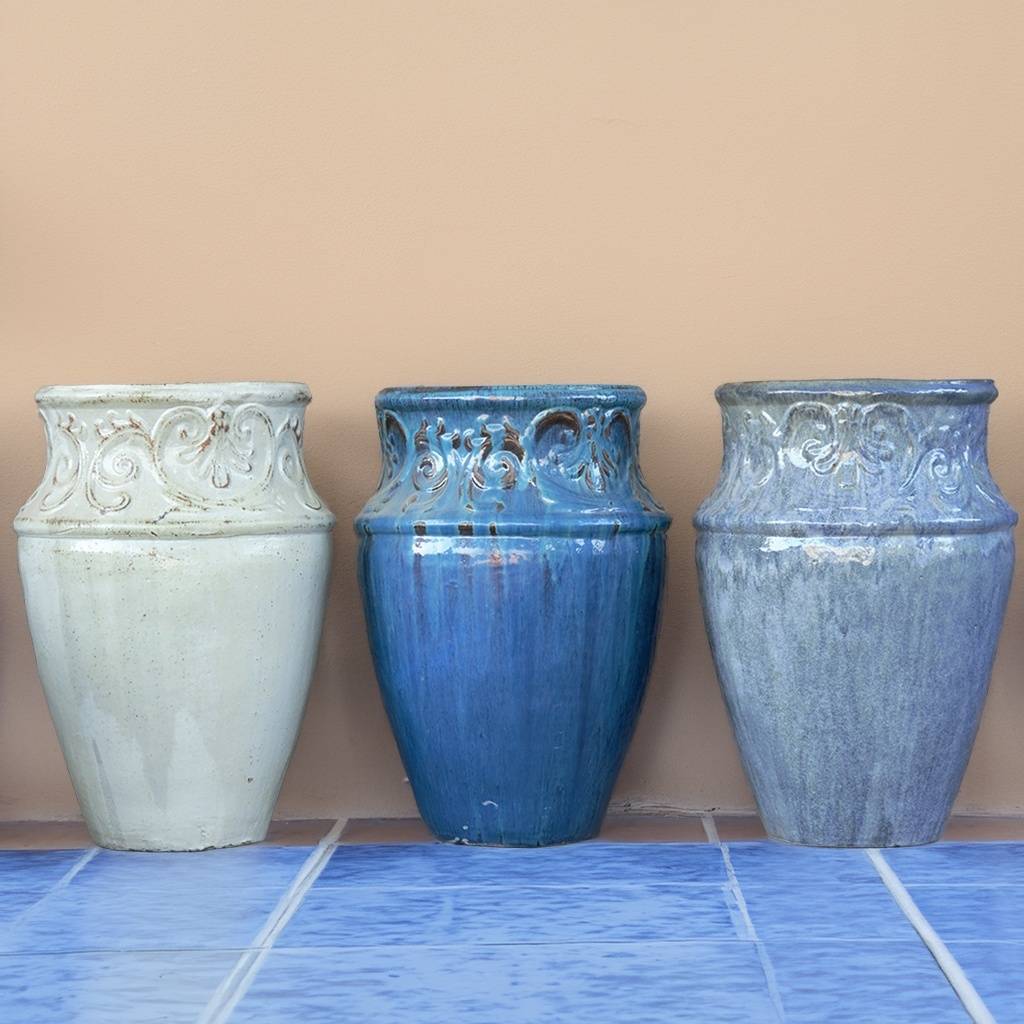 Set of 3 vase-style ceramic planters featuring antique white, glossy blue, and glossy gray finishes