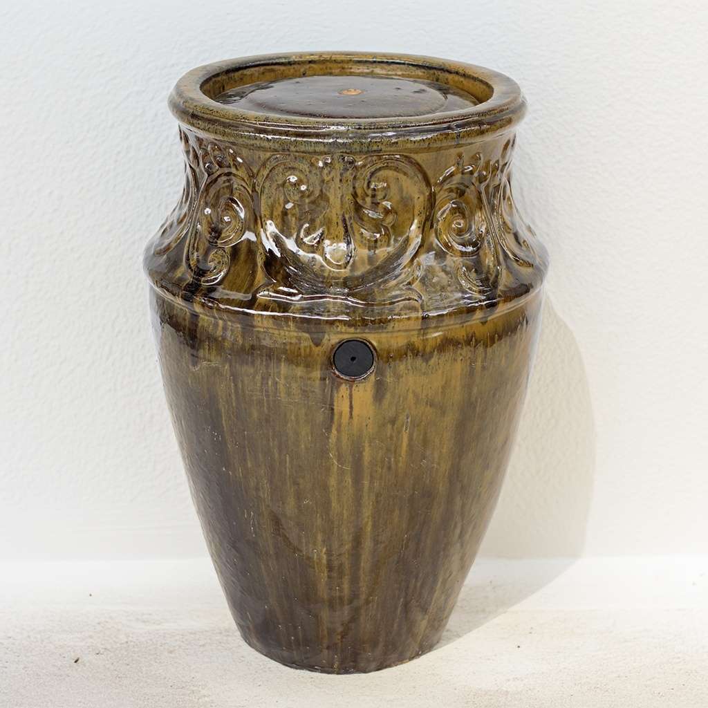 Vase-style ceramic planter with a glossy golden brown finish