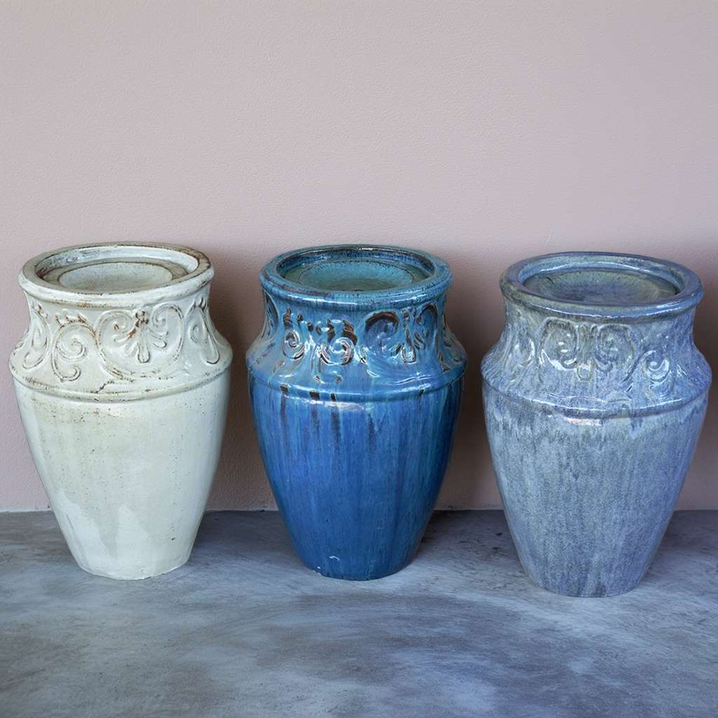 Set of 3 vase-style ceramic planters featuring antique white, glossy blue, and glossy gray finishes