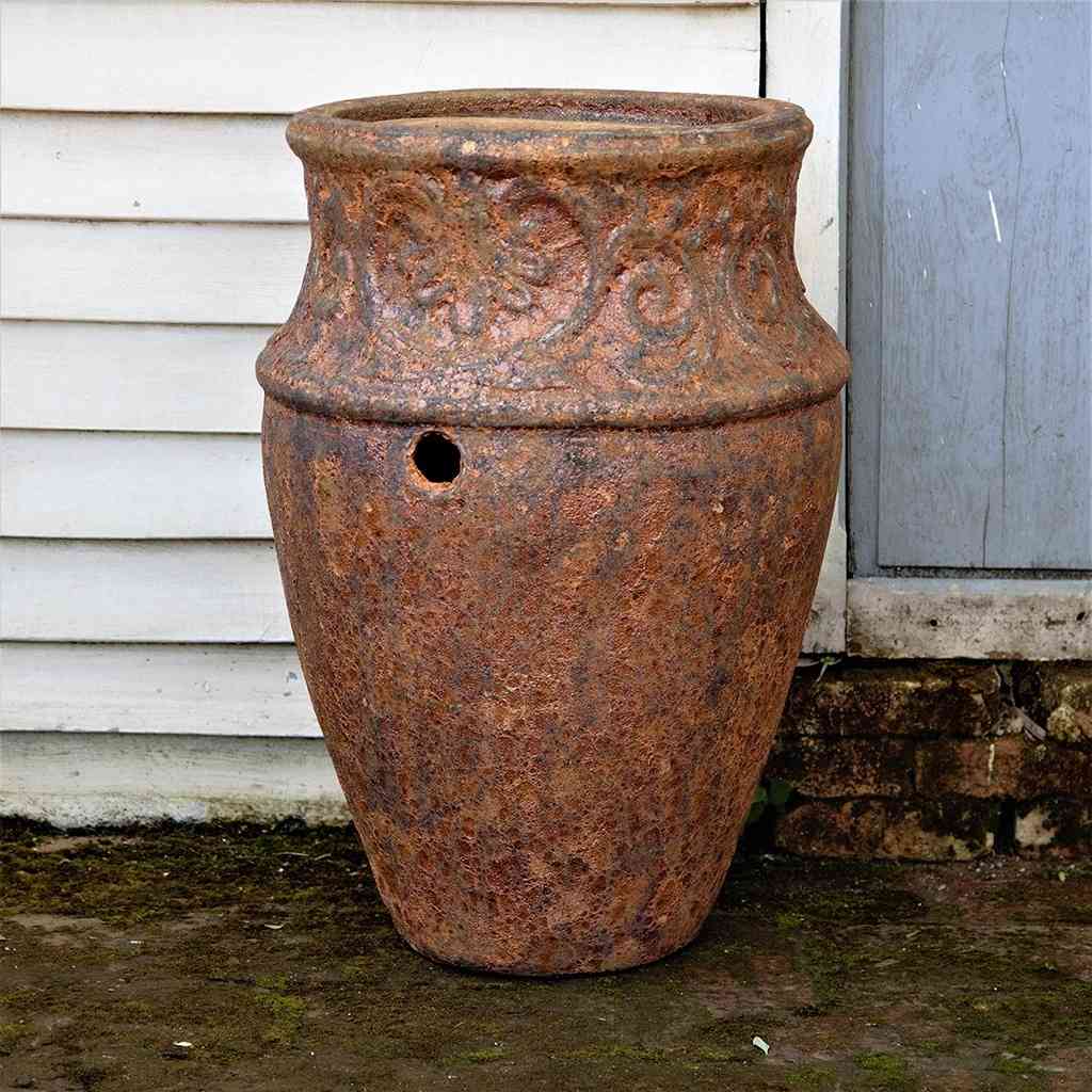 Vase-style ceramic planter with a rustic, textured finish