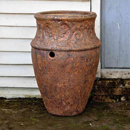 Vase-style ceramic planter with a rustic, textured finish