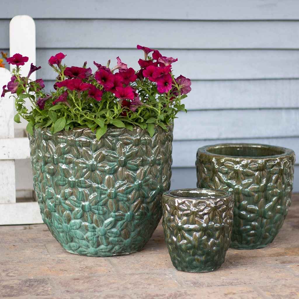 Wholesale Petal pattern ceramic planters in earthy, mottled green