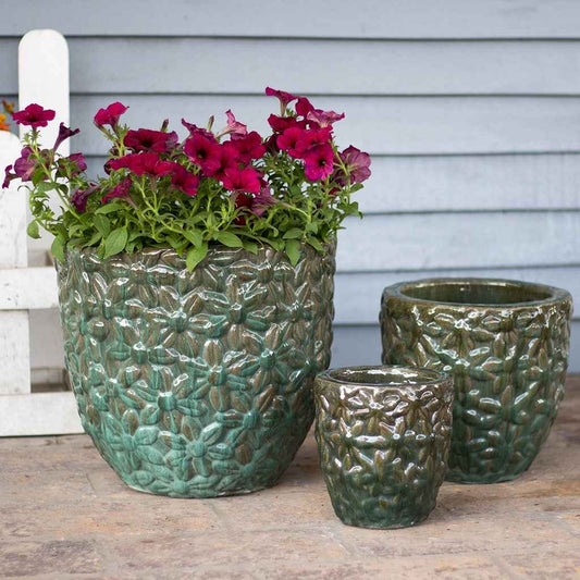 Wholesale Petal pattern ceramic planters in earthy, mottled green