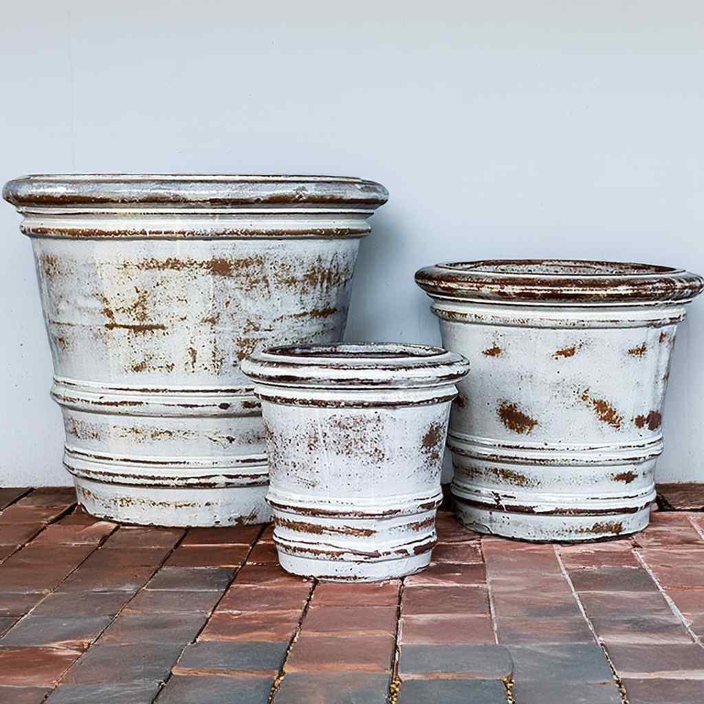 Whitewashed ceramic planters featuring a frosted rim