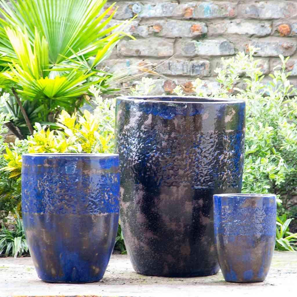Tuscany tall rounded ceramic planter with a glossy blue-brown finish