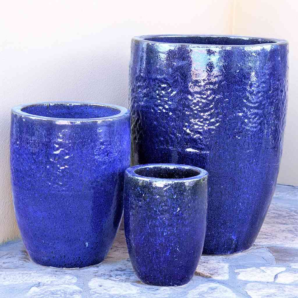 Tuscany tall rounded ceramic planter with a glossy blue finish