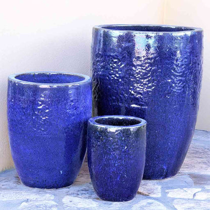 Tuscany tall rounded ceramic planter with a glossy blue finish