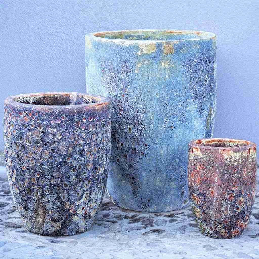 Tuscany tall rounded ceramic planter in muted blue with mottled reddish-brown accents