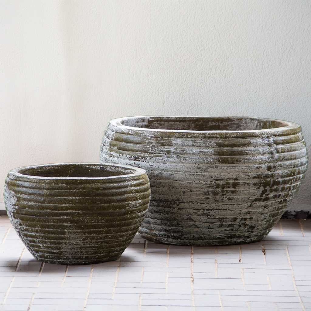 Ribbed bowl ceramic planters with a distressed green finish