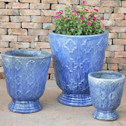 Quatrefoil pedestal ceramic planters with a whitewashed finish