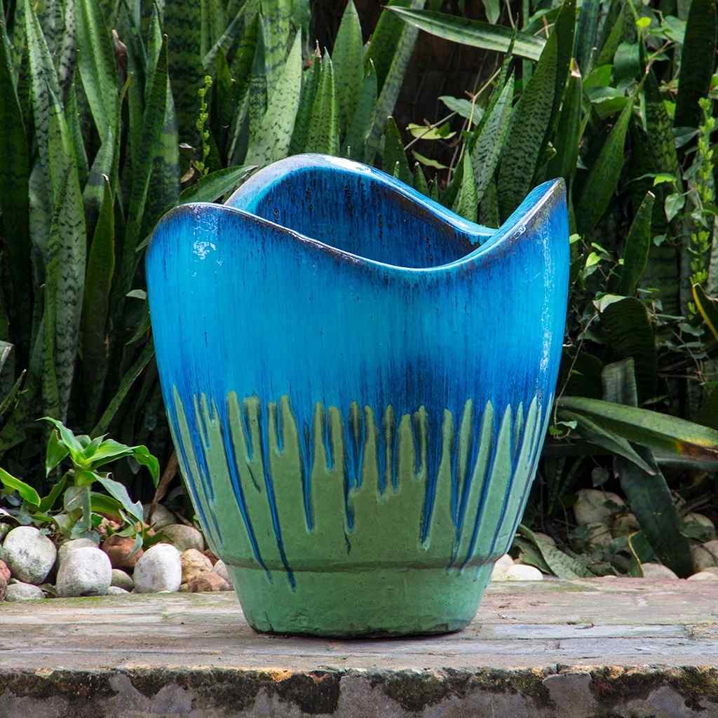 Wave-top ceramic planter in green and blue with a dripping glaze effect
