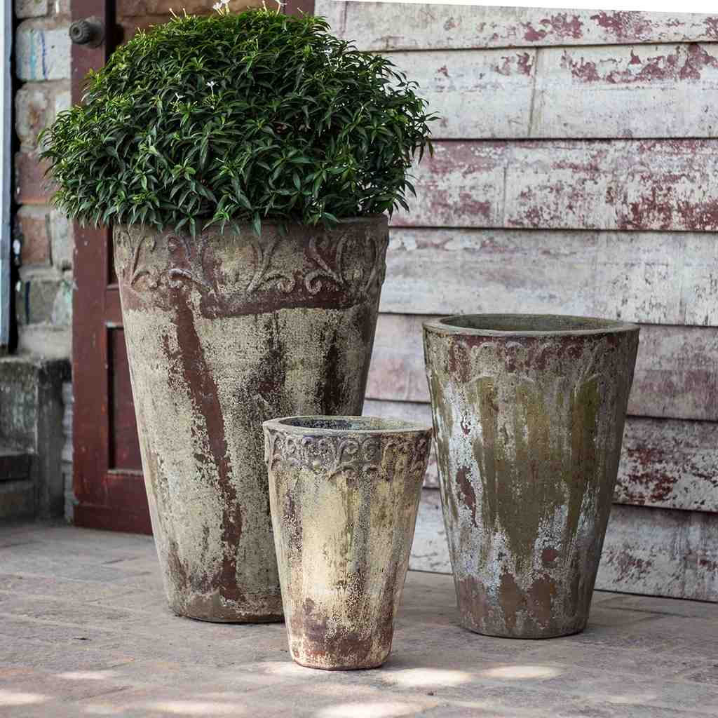 Wholesale Tall ceramic planter in aged beige with brown and greenish weathered accents