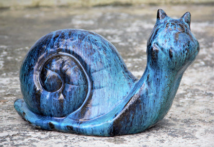Glossy blue ceramic snails for garden