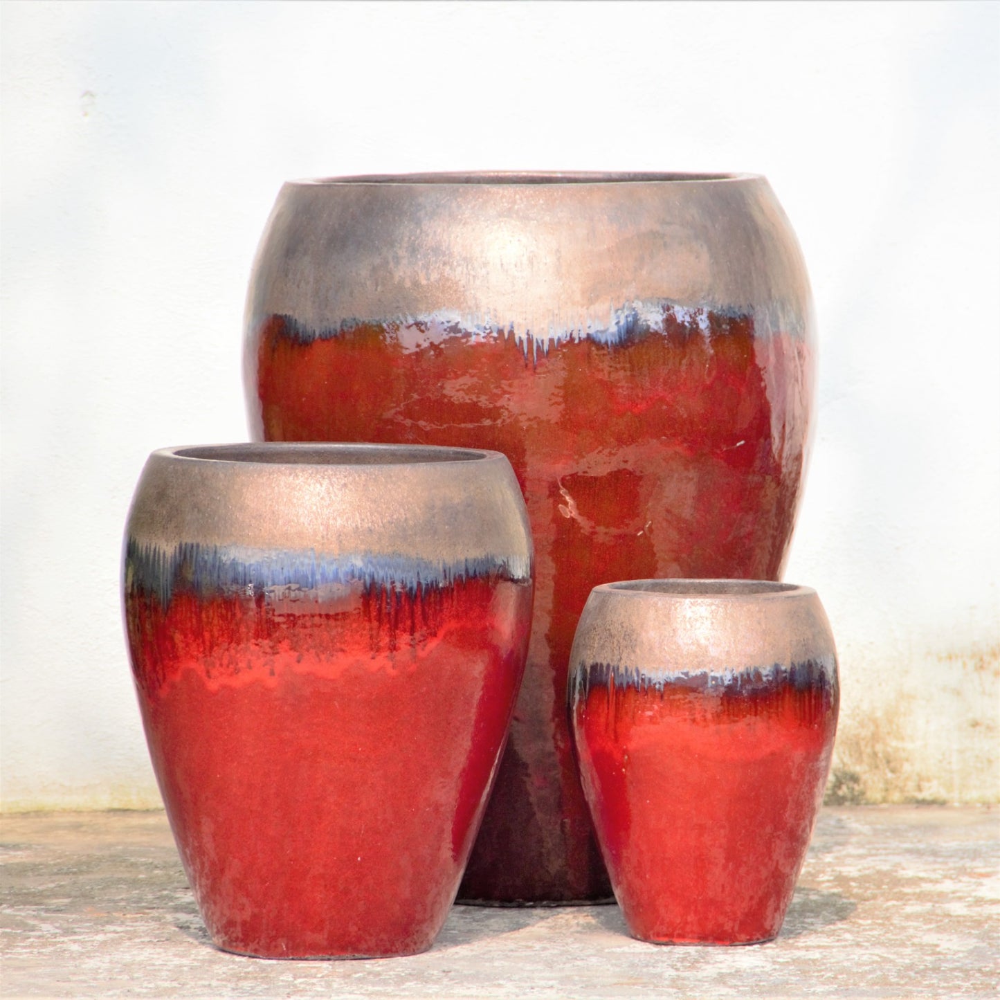 Red Egg-Shaped Planter Pot with Rustic Rim