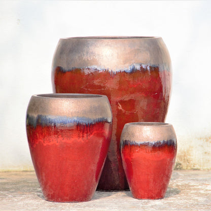 Red Egg-Shaped Planter Pot with Rustic Rim