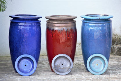 Glossy blue, red and light blue water jar fountains