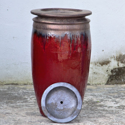 Glossy red water jar fountain