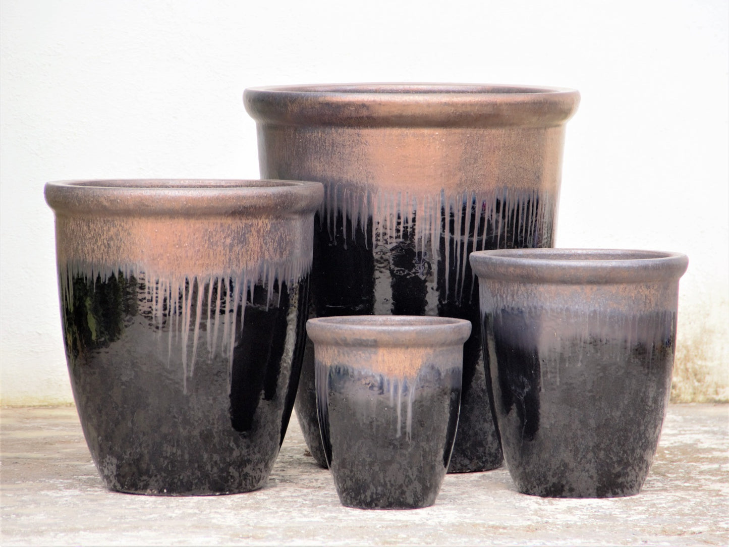 Tall Black planter with metallic flared rim