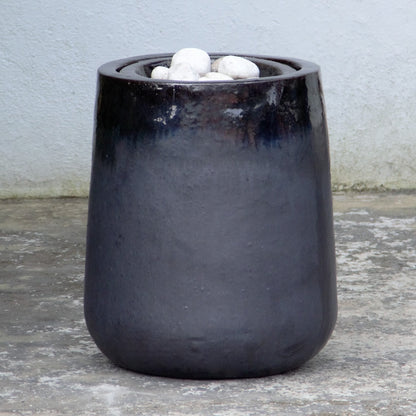 Black/gray textured fountain jar with white stones